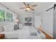 Bright bedroom with a large bed and TV, showcasing clean decor at 919 Boardman St, Orlando, FL 32804