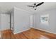 Cozy bedroom with hardwood floors and neutral paint at 919 Boardman St, Orlando, FL 32804