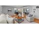 Open-concept living room flows into the kitchen and dining area, ideal for entertaining and Gathering gatherings at 919 Boardman St, Orlando, FL 32804