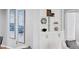 Bright living room showcases decor art, shelving and a view through to the next room at 919 Boardman St, Orlando, FL 32804