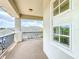 Relaxing balcony with black metal railings, providing a scenic view of the surrounding neighborhood at 9421 Dugard Ct, Orlando, FL 32827