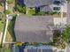 Birds eye view of the house reveals its mature landscaping and charming architecture at 10356 Stone Glen Dr, Orlando, FL 32825