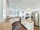 Large kitchen featuring granite countertops, a kitchen island, and stainless steel appliances at 10356 Stone Glen Dr, Orlando, FL 32825