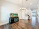 Open floor plan, with office nook, and hardwood floors at 10356 Stone Glen Dr, Orlando, FL 32825