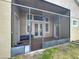 Fully screened porch is the perfect place to enjoy the outdoors without the bugs at 10356 Stone Glen Dr, Orlando, FL 32825