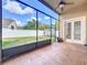 Screened in porch provides the perfect indoor/outdoor living space at 10356 Stone Glen Dr, Orlando, FL 32825