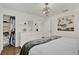 Bright bedroom with ample closet space, stylish decor, and access to an en-suite bathroom at 108 S Glenwood Ave, Orlando, FL 32803