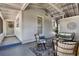 Inviting covered patio featuring comfortable seating, stylish decor, and a relaxing ambiance with lots of natural light at 108 S Glenwood Ave, Orlando, FL 32803