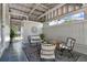 Relaxing covered patio featuring comfortable seating, stylish decor, and an inviting space to unwind at 108 S Glenwood Ave, Orlando, FL 32803