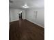 View of the Living Room featuring hard wood floors, neutral colors, and natural light at 1125 W 8Th St, Lakeland, FL 33805