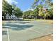 Spacious outdoor basketball court, perfect for sports and recreation in a community park setting at 11401 Willow Stowe Ln, Windermere, FL 34786