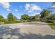 Community basketball court with benches for relaxation among landscaped surroundings at 11401 Willow Stowe Ln, Windermere, FL 34786