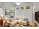 Cozy living room featuring recessed lighting, hardwood floors, and a comfortable sectional couch at 11401 Willow Stowe Ln, Windermere, FL 34786