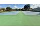 Community tennis courts offer a vibrant space for sports with well-maintained surfaces at 11401 Willow Stowe Ln, Windermere, FL 34786