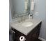 Bathroom vanity with marble countertop and fixtures in a traditional style at 1160 Rolling Acres Dr, Deland, FL 32720