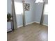 Bedroom featuring tiled floor, neutral paint, and curtains hanging over the window at 1160 Rolling Acres Dr, Deland, FL 32720
