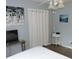 This bedroom features a closet with white curtains at 1160 Rolling Acres Dr, Deland, FL 32720
