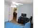 Bedroom featuring hardwood floors with view into dining area at 1160 Rolling Acres Dr, Deland, FL 32720