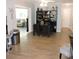 This dining room features sleek black furniture and decor for an elegant, modern look at 1160 Rolling Acres Dr, Deland, FL 32720
