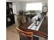 Open dining room with hardwood floors that connects to the main living area and allows natural light at 1160 Rolling Acres Dr, Deland, FL 32720