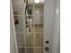 Laundry room featuring vinyl floors, washer, dryer, and storage space at 1160 Rolling Acres Dr, Deland, FL 32720