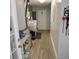 Functional laundry room featuring a washer, dryer, and organized storage solutions at 1160 Rolling Acres Dr, Deland, FL 32720