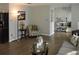 Open living room featuring an accent chair, stylish decor, and neutral paint at 1160 Rolling Acres Dr, Deland, FL 32720