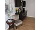Living room featuring elegant decor, stylish furniture, and wood-look tile flooring at 1160 Rolling Acres Dr, Deland, FL 32720