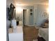 Spacious main bedroom features a TV, wood floors, and a sitting area for relaxation at 1160 Rolling Acres Dr, Deland, FL 32720