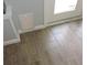 Pet door installed in the wall with tile flooring at 1160 Rolling Acres Dr, Deland, FL 32720