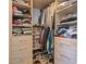 Well-organized closet with drawers, shelves, and hanging space for clothing and shoes at 11734 Lake Willis Dr, Orlando, FL 32821