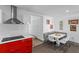 Eat in kitchen with modern table, chairs, and textured wall at 11734 Lake Willis Dr, Orlando, FL 32821