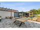 Backyard with pool, ping pong table and an outdoor kitchen at 11734 Lake Willis Dr, Orlando, FL 32821