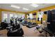 Modern fitness center with various exercise machines and equipment in a brightly lit space at 119 Hypolita Ave, Davenport, FL 33897