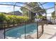 Beautiful screened-in pool area, perfect for relaxing and entertaining outdoors at 121 Edgewater Cir, Sanford, FL 32773