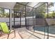 Relaxing screened patio area with pool access and outdoor seating, ideal for entertaining at 121 Edgewater Cir, Sanford, FL 32773