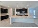 Modern kitchen with stainless steel appliances and quartz countertops at 1243 Bear Oak Ln, Deland, FL 32720