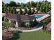 Resort style community pool area surrounded by lounge chairs and lush landscaping. Perfect place to relax at 1243 Bear Oak Ln, Deland, FL 32720