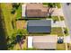 Aerial view of home showing the roof, yard, and surrounding landscape at 12817 Parkbury Dr, Orlando, FL 32828