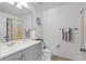 Well-lit bathroom featuring modern fixtures and a tile floor at 12817 Parkbury Dr, Orlando, FL 32828