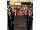 Walk-in closet with shelving and hanging rods for storage at 12817 Parkbury Dr, Orlando, FL 32828