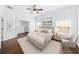 Staged bedroom featuring hardwood floors, neutral decor and a ceiling fan at 1333 W Yale St, Orlando, FL 32804