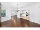 Dining area with hardwood floors connecting to the living room and kitchen at 1333 W Yale St, Orlando, FL 32804