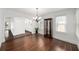 Elegant dining room with hardwood floors, chandelier, and classic display cabinet at 1333 W Yale St, Orlando, FL 32804