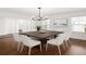Well-lit dining area with modern chandelier, hardwood floors, and white accents at 1333 W Yale St, Orlando, FL 32804