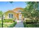 Charming home featuring a well-manicured lawn and inviting entrance with mature landscaping at 1333 W Yale St, Orlando, FL 32804