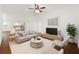 Open-concept living room with hardwood floors and modern decor and furnishings at 1333 W Yale St, Orlando, FL 32804