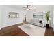 A decorated living room featuring hard wood floors, white walls and ample space at 1333 W Yale St, Orlando, FL 32804