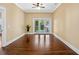 Living room boasts hardwood floors and glass doors leading to the backyard at 1333 W Yale St, Orlando, FL 32804