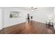 Spacious living room with hardwood floors and an open archway to other rooms at 1333 W Yale St, Orlando, FL 32804